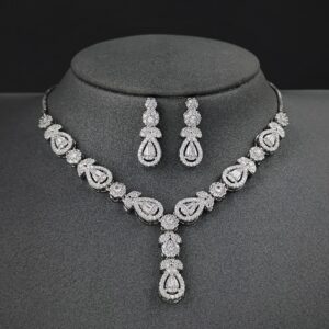 A stunning and elegant jewelry set designed for brides, including a necklace, earrings, and matching accessories.