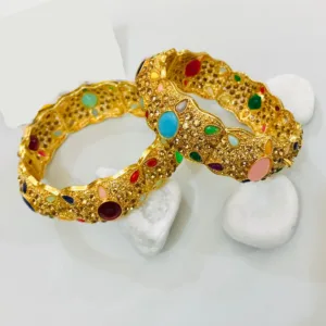 Buy online the latest Kara for women's fashion jewellery in Pakistan. This Gold-platted Naurateen Stone Bracelet Kara enriched with gemstones, creates more confidence in the fashion world. Buy online from Aiksow with confidence