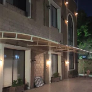 Modern house front shed design durable tensile fabric roofing offering a modern twist on traditional architecture. this latest shed design is very suitable for sun and rain protection